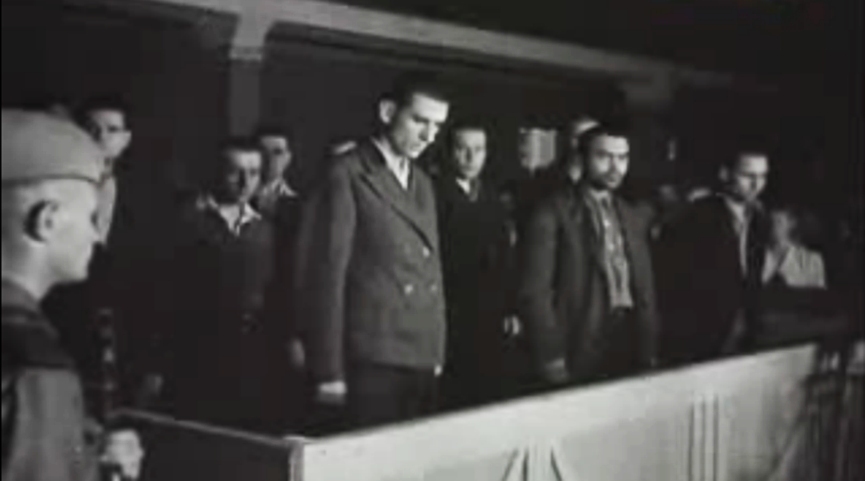 Подсудимые процесса 1943 года во время оглашения приговора — кадр из документального фильма «Приговор народа». Источник: warhead.su.